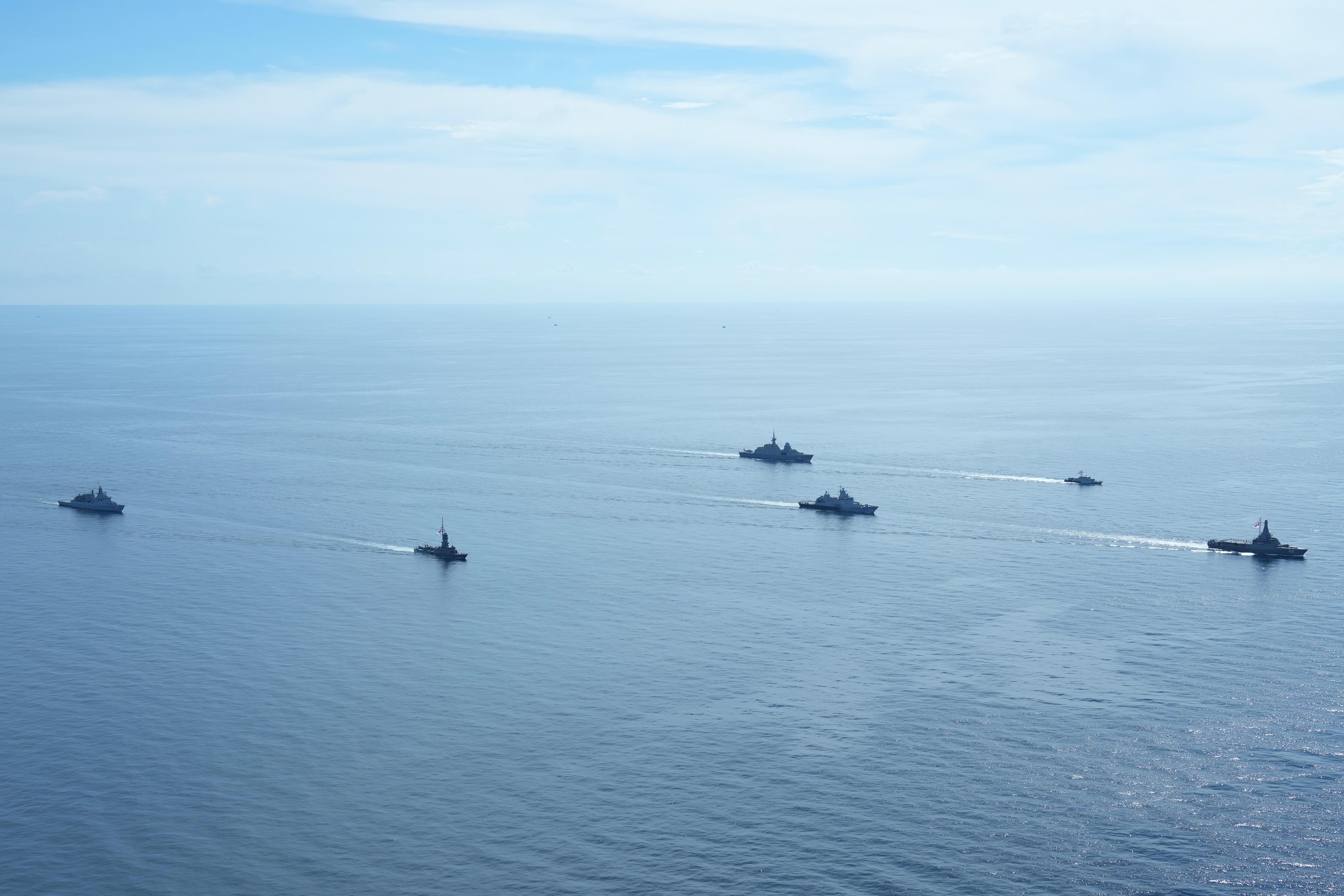 Republic of Singapore Navy (RSN) and Royal Malaysian Navy (RMN) ships sailing in formation.